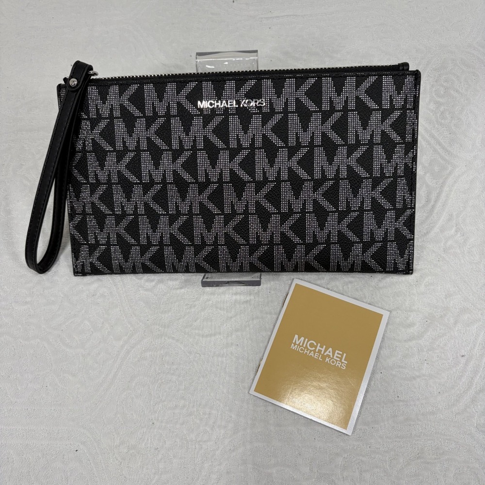 Michael Kors Jet Set Large Zip Clutch wristlet black/silver MK monogram pattern